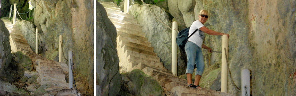 person standing on a rock wall