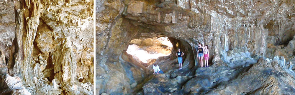 a group of people standing in a cave