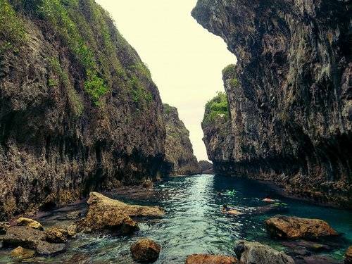 a river between rocky cliffs