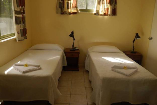 twin single beds at Nics Bungalow