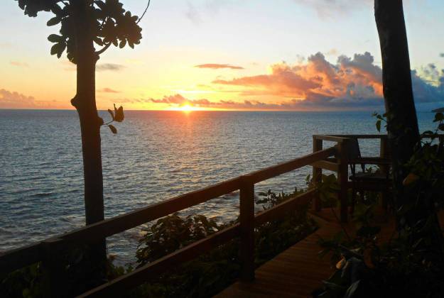 a wooden deck overlooking a body of water