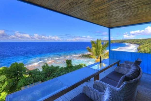 a deck overlooking a beach