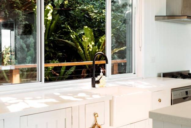 Beautiful Kitchen area with good sunlight at accommodation Tuhia Sunrise