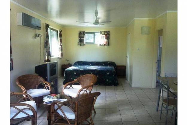 studio bedroom with chairs